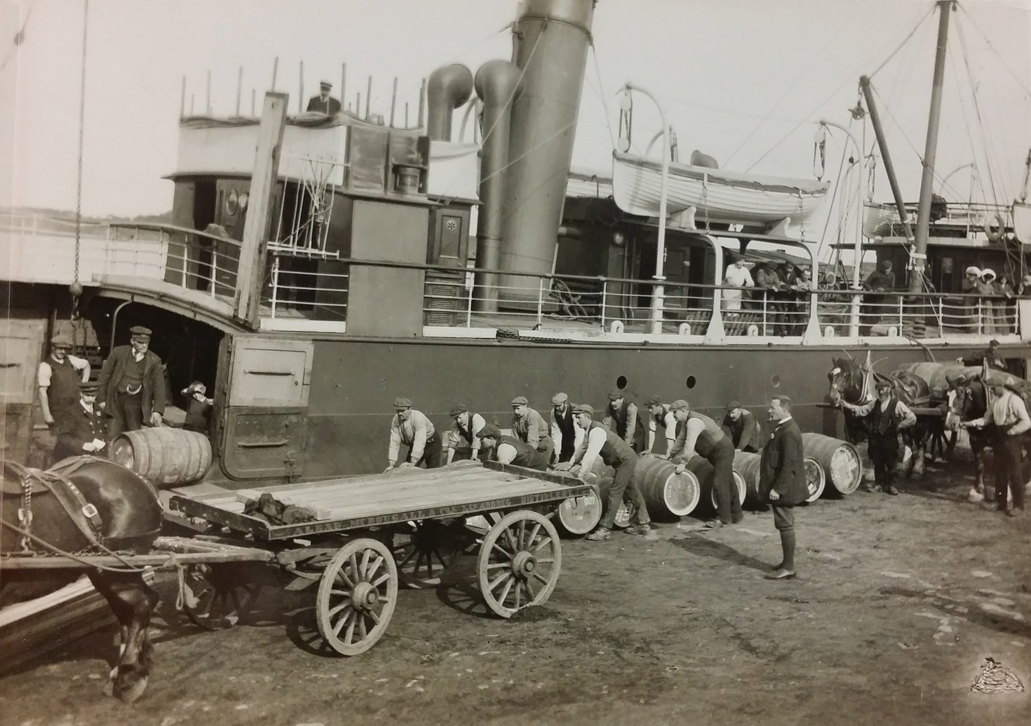 Loading casks of whisky at Ardbeg Pier c.1912